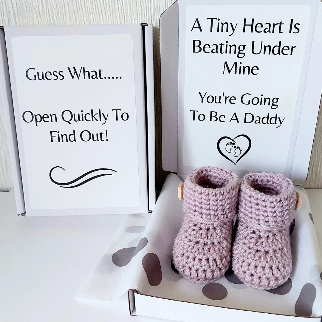 Pregnancy Announcement bcluding a pair of handmade newborn baby booties