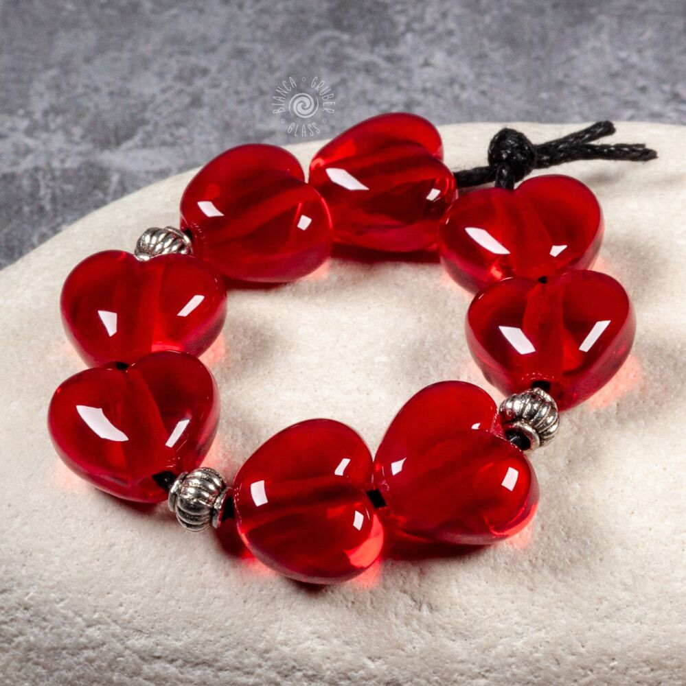 Small heart bead set of four pairs – transparent red