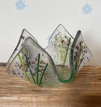 purple draped candle dish