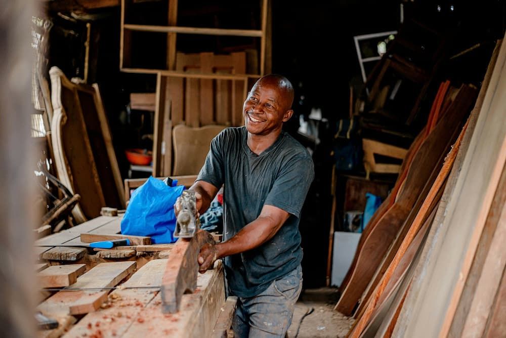 Man using woodwork equipment