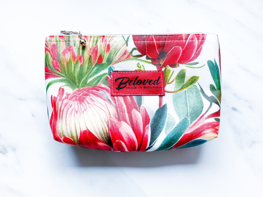 Bold orange/rust protea small cosmetic bag