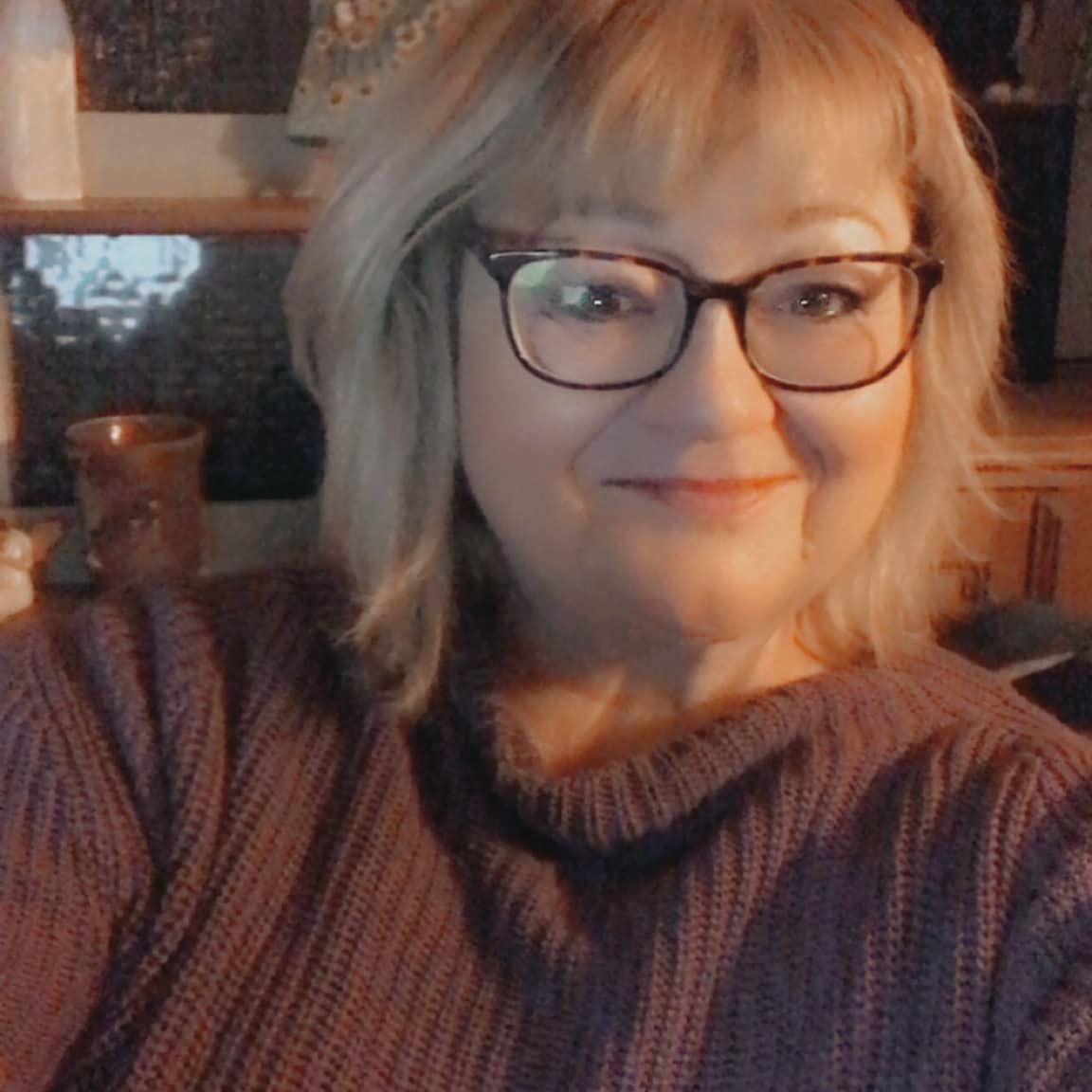 Tess in a purple top