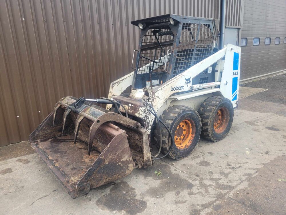 0398: Bobcat 743 Skid Steer Loader, Kubota 4 Cylinder Engine, c/w Grab & Bucket. Age & Hours Unknown, &pound;5,250 Plus Vat.