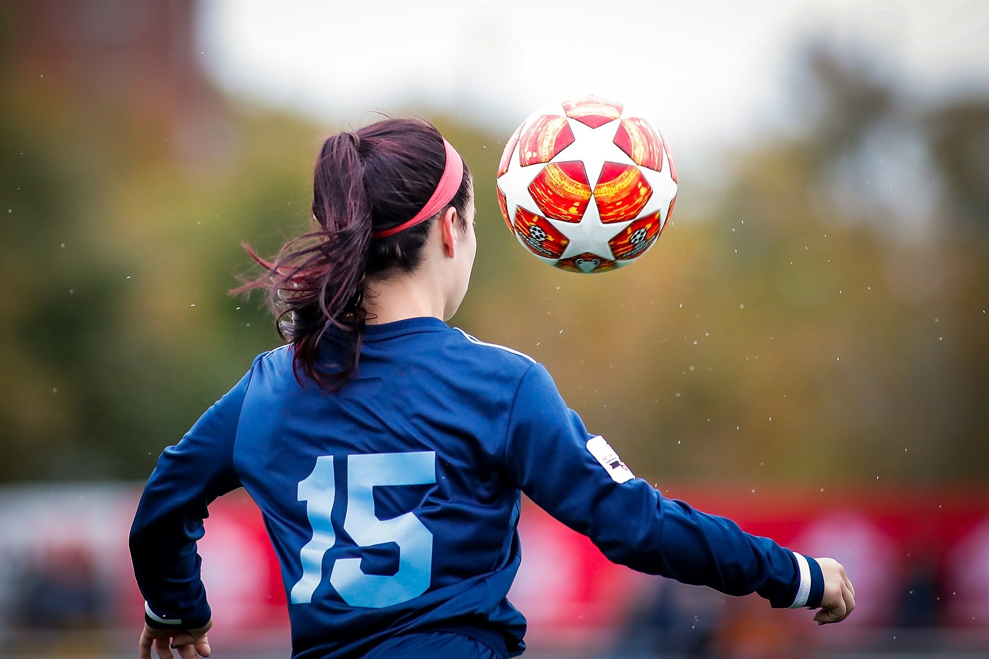 girl-in-blue-and-white-nike-soccer-jersey-shirt-rOYAYXHgEh4.jpg