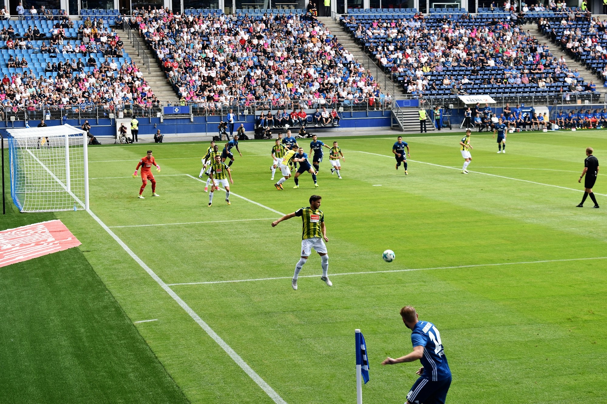 men-playing-soccer-of-soccer-field-during-daytime-PhhtSyCeN0I