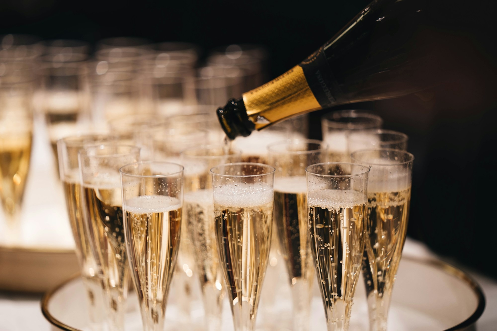 clear-drinking-glass-with-brown-liquid-xzKtOI1Cnxo