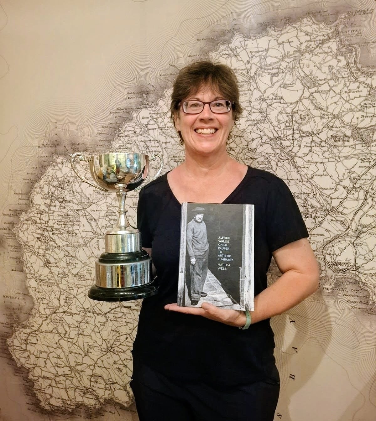 Matilda Webb holding the Leonard Truran Cup for Most Outstanding Entry 2026